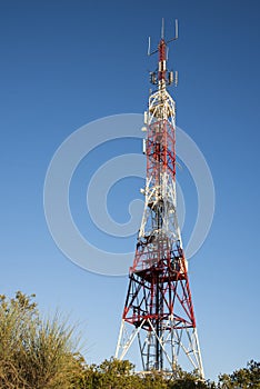 Telecommunication towers with blue sky in the background photo