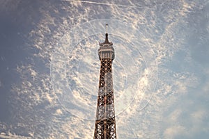 Telecommunications and broadcasting. Tower top on cloudy blue sky. TV tower outdoors. Mast or tower. Transmitting