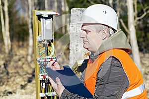 Telecommunications fitter near Communication Cables enclosure