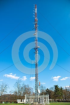 Telecommunications radio tower in the city park