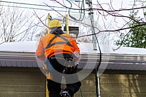 Telecommunications technician at work