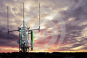 Telecommunications tower, antenna and satellite dish
