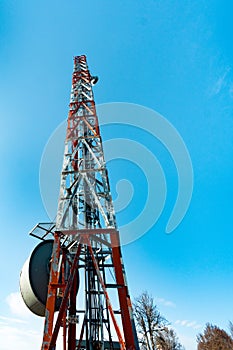 Telecommunications tower with blue sky