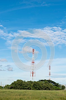 Telecommunications tower with blue sky background