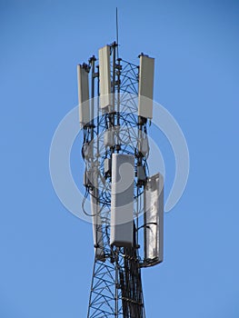 Telecommunications tower. Mobile phone base station.