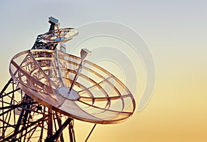 Telecommunications tower at the sunset