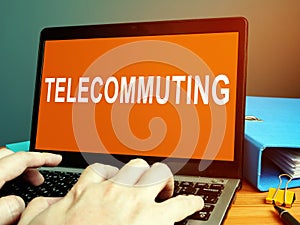 Telecommuting word on the screen photo