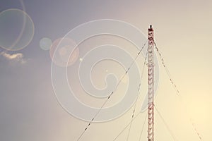 Telecomunacition radio antenna, satellite tower on blue sky back