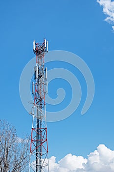 Telecomunication tower antenna over blue sky