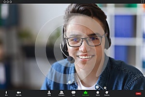 Teleconference. POV Shot Of Video Call With Smiling Young Man Wearing Headset