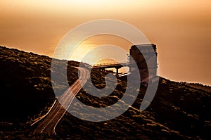 Telecope observatory on a mountain with the Atlantic Ocean. Road trip La Palma. Telescope dome in sunset. Dark sky site. Roque de