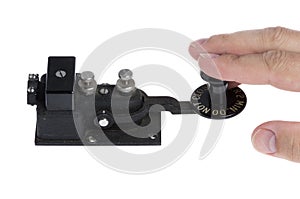 Telegraph key with hand operating it