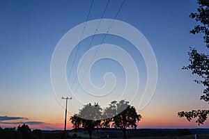 telegraph pole at colorful sunset