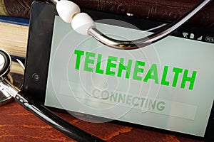 Telehealth apps open in a smartphone photo