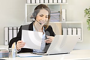Telemarketer attending a call at office