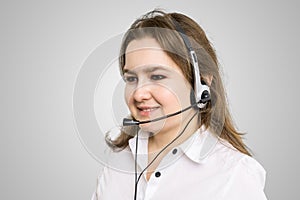 Telemarketing and customer service concept. Young smiling woman.