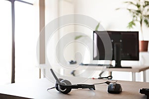 Telemarketing headset lying on the table photo