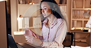 Telemarketing, night working and woman at a computer doing call center work with communication. Talk, customer support