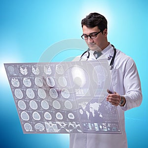 Telemedicine concept with doctor looking at x-ray image