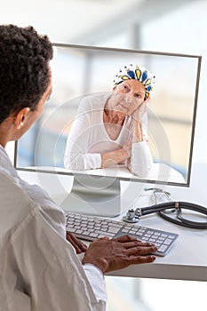 Telemedicine or telehealth concept, Doctor on the computer laptop screen and patient conferencing on treatment after