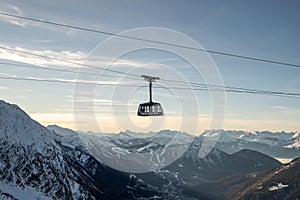 Telepherique cable car in the air on the way up to Aiguille du plan photo