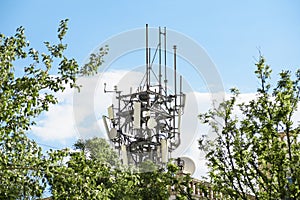 Telephone base station that spoils the natural view among the trees