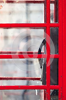 Telephone Behind Window Glass