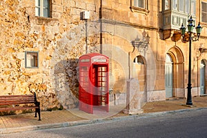 Telephone Booth in Street of Gozo Malta photo