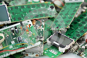 Telephone circuit board parts are being disassembled as electronic waste in the factory. electronic equipment