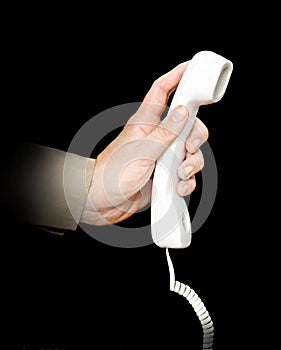 Telephone handset in hand