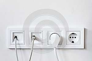 Telephone, internet and electrical socket outlet with conncetion cables