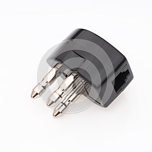 Telephone jack adaptor plug. US on white.