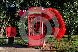 Telephone red English box, inscription phone