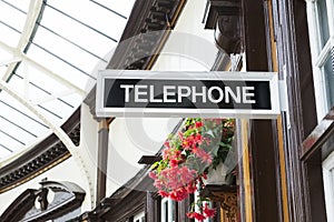 Telephone sign in victorian train station at Wemyss Bay in Scotland