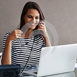 Telephone, smile and business woman with laptop in conversation, talk or listening to contact with glasses in startup