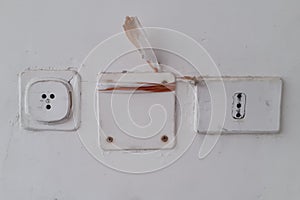 Telephone wall socket and vintage electricity in Italy
