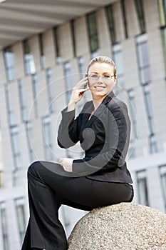 Telephoning businesswoman