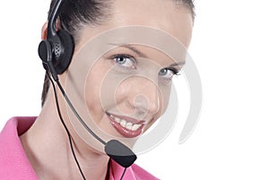 Young adult female woman telephonist, customer service, headset, smiling, looking at camera, white background