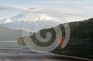 telephoto of red torii gate with Fuji mountain background