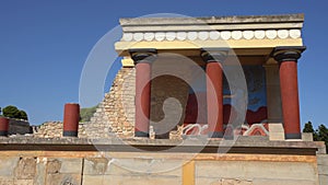 Telephoto shot of the north entrance to the Minoan Palace of Knossos in Heraklion, Crete, Greece with the charging bull