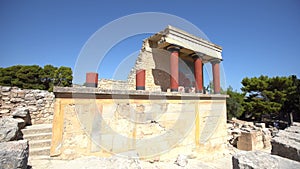 Telephoto shot of the north entrance to the Minoan Palace of Knossos in Heraklion, Crete, Greece with the charging bull