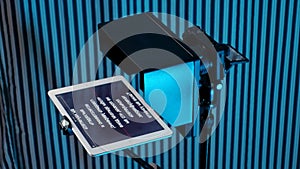 teleprompter for video. The reading text is reflected from the glass surface opposite the video camera lens