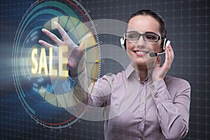 The telesales concept with woman pressing button