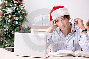 The telesales operator during christmas sale on the phone