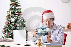 The telesales operator during christmas sale on the phone
