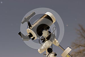 Telescope in night sky Winter edition