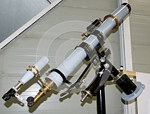 Telescope refractor on equatorial display