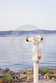 Telescope on the sea-summer, sun, sea, beach