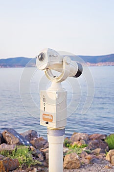 Telescope on the sea-summer, sun, sea, beach