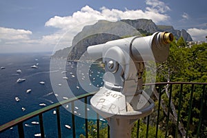 Telescope viewer of City of Capri, an Italian island off the Sorrentine Peninsula on the south side of Gulf of Naples, in the